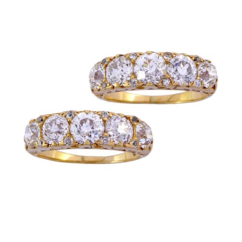 Pair of late 19th /early 20th century five stone diamond rings by Tiffany, c.1900, with graduated old European cut diamonds,